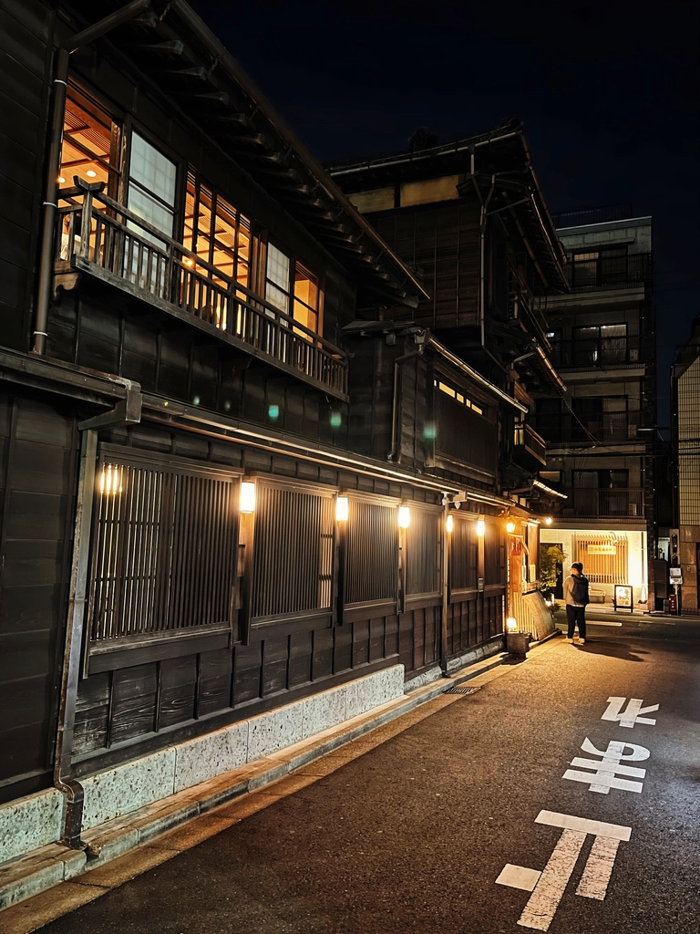 Traditional Kyoto street exterior with warm evening lighting