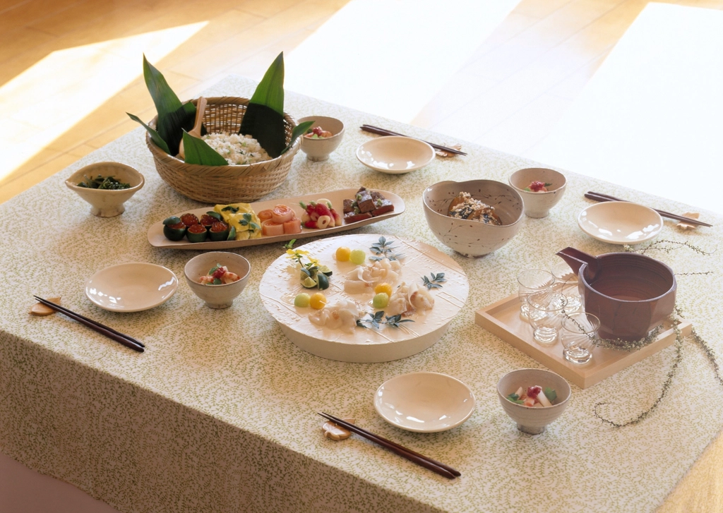 Seasonal Japanese multi-course table setting prepared for a composed meal